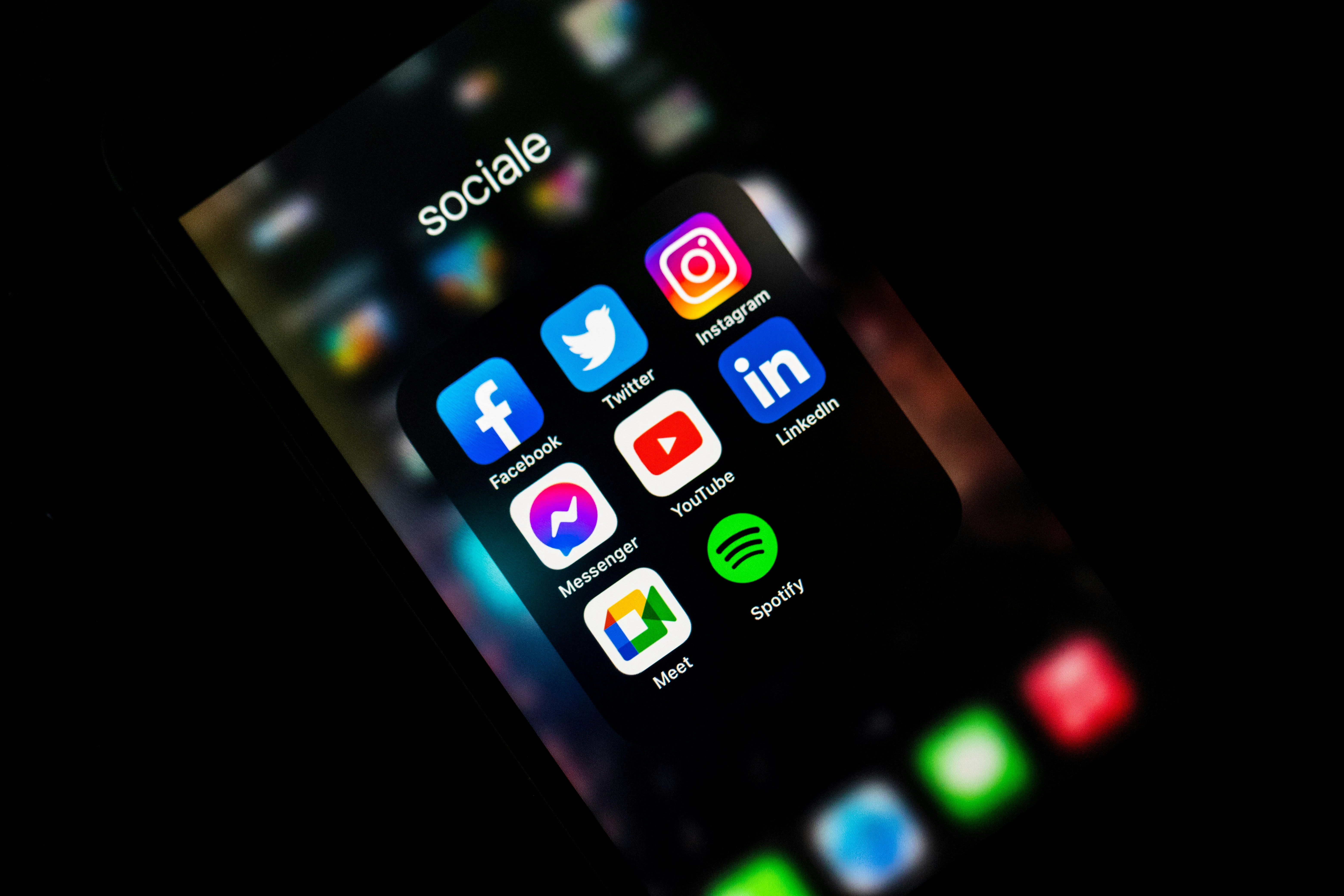 Smartphone showing social media app icons